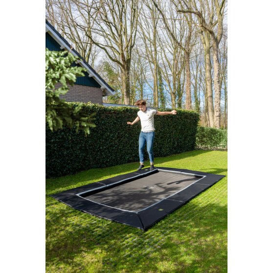 EXIT Dynamic ground level trampoline 244x427cm with Freezone safety tiles - black